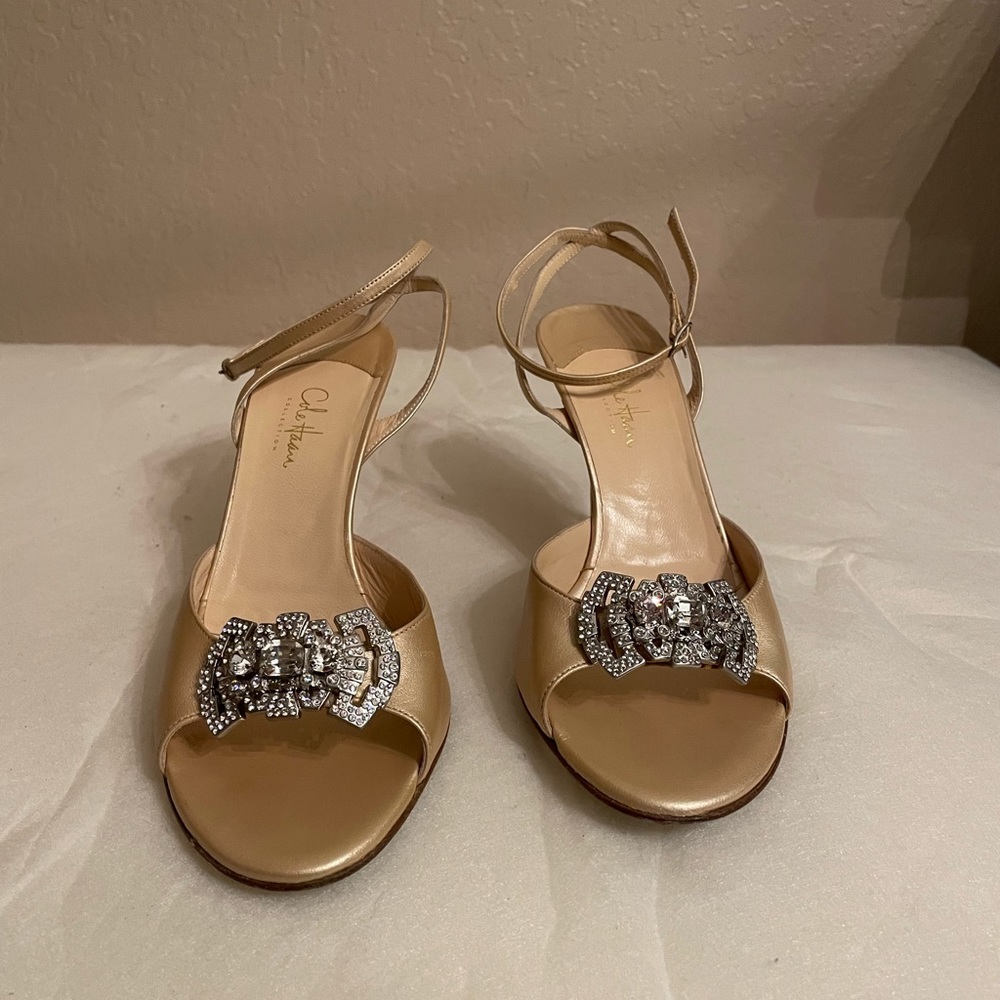Gold Cole Haan Heels with rhinestone accent